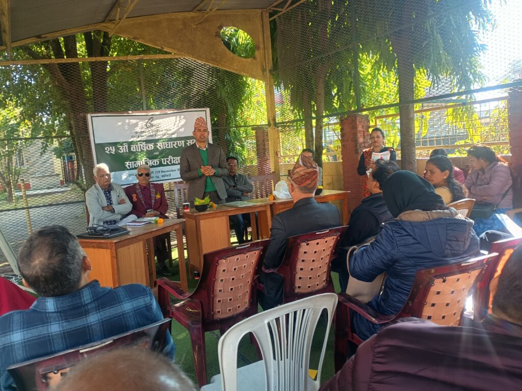 A group of individual attending the program and the chief guest giving his speech